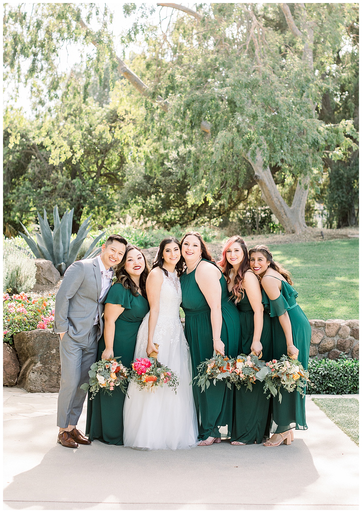 Emerald Green Bridesmaids Dress
Bridesman in Grey Suit