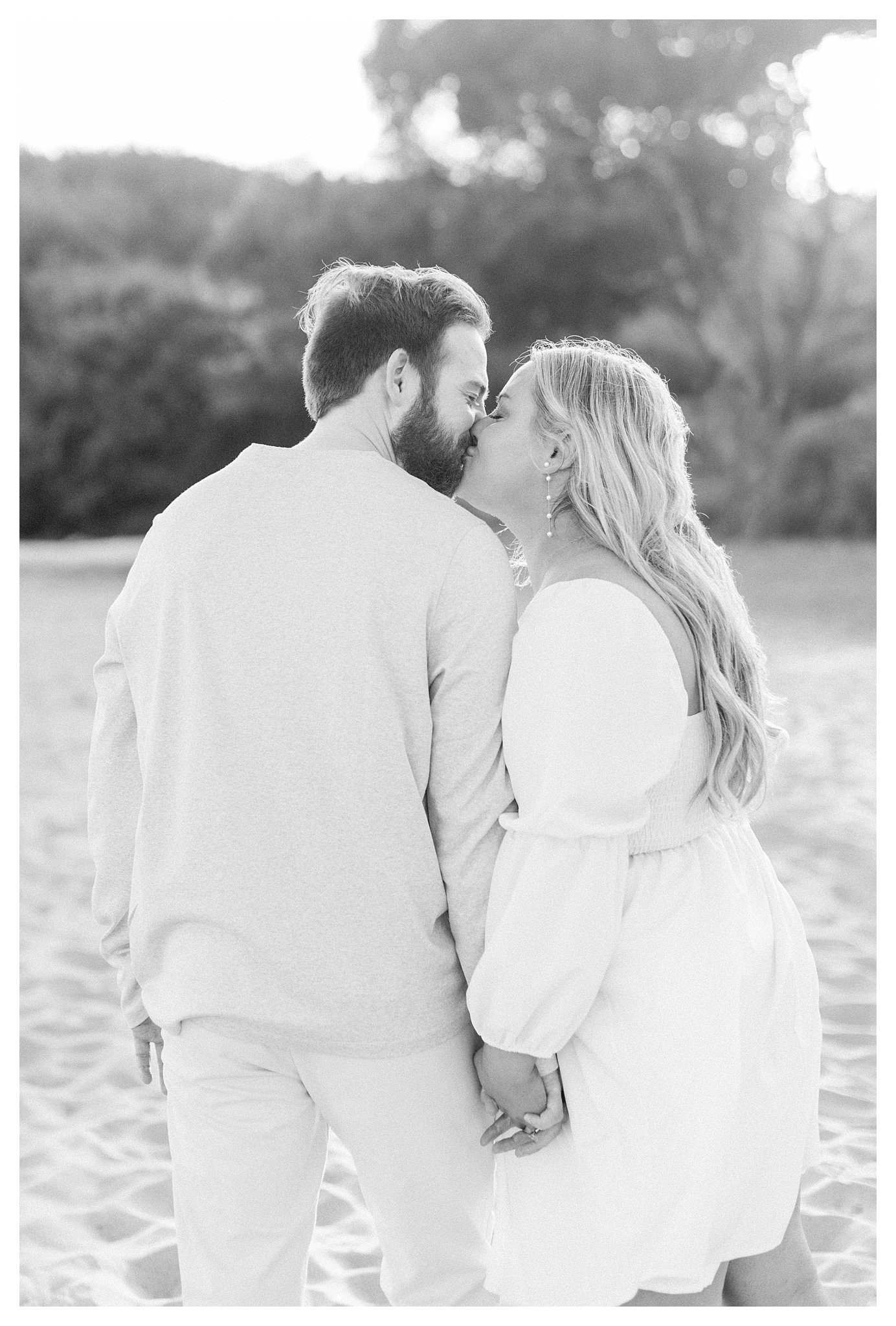 A couple kissing during an engagement session in Malibu, Ca.