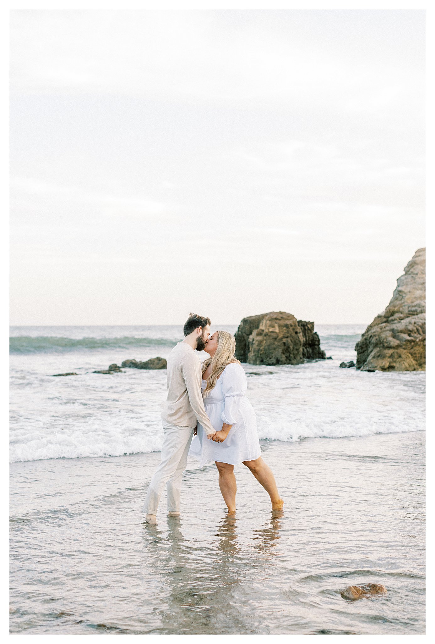 A couple kissing during an engagement session in Malibu, Ca.