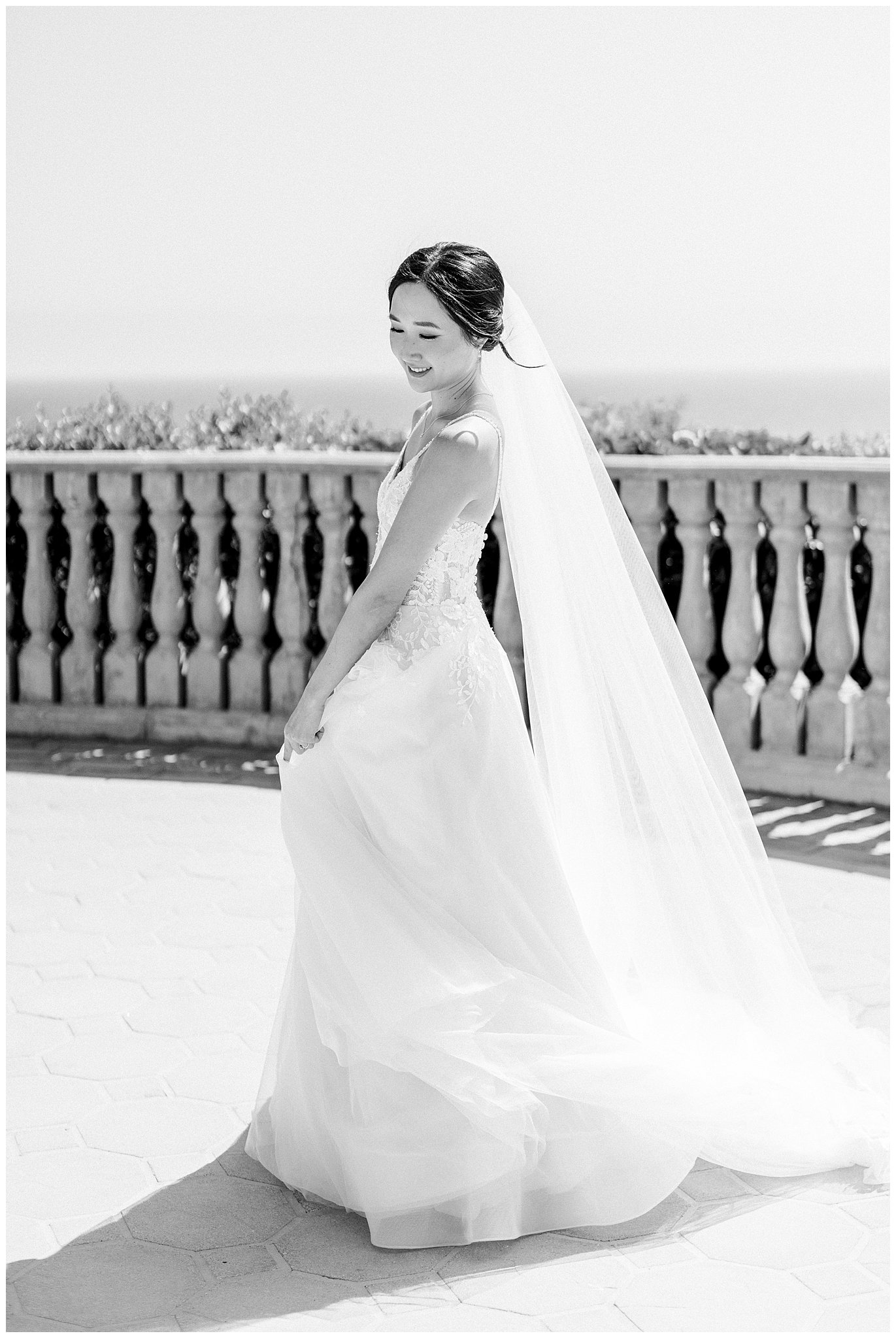 Bride twirling in her wedding gown at Bel Air Bay Club.