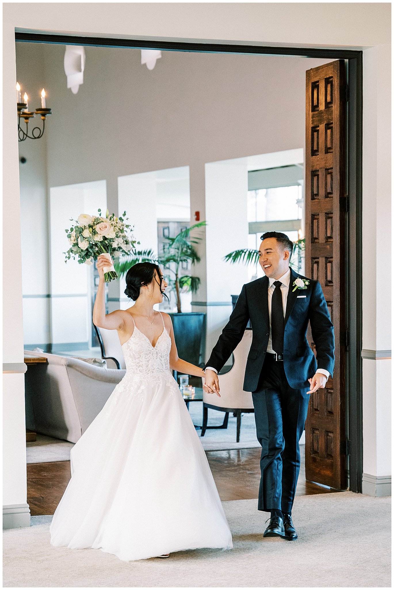 Bride and groom during their grand entrance at Bel Air Bay Club.