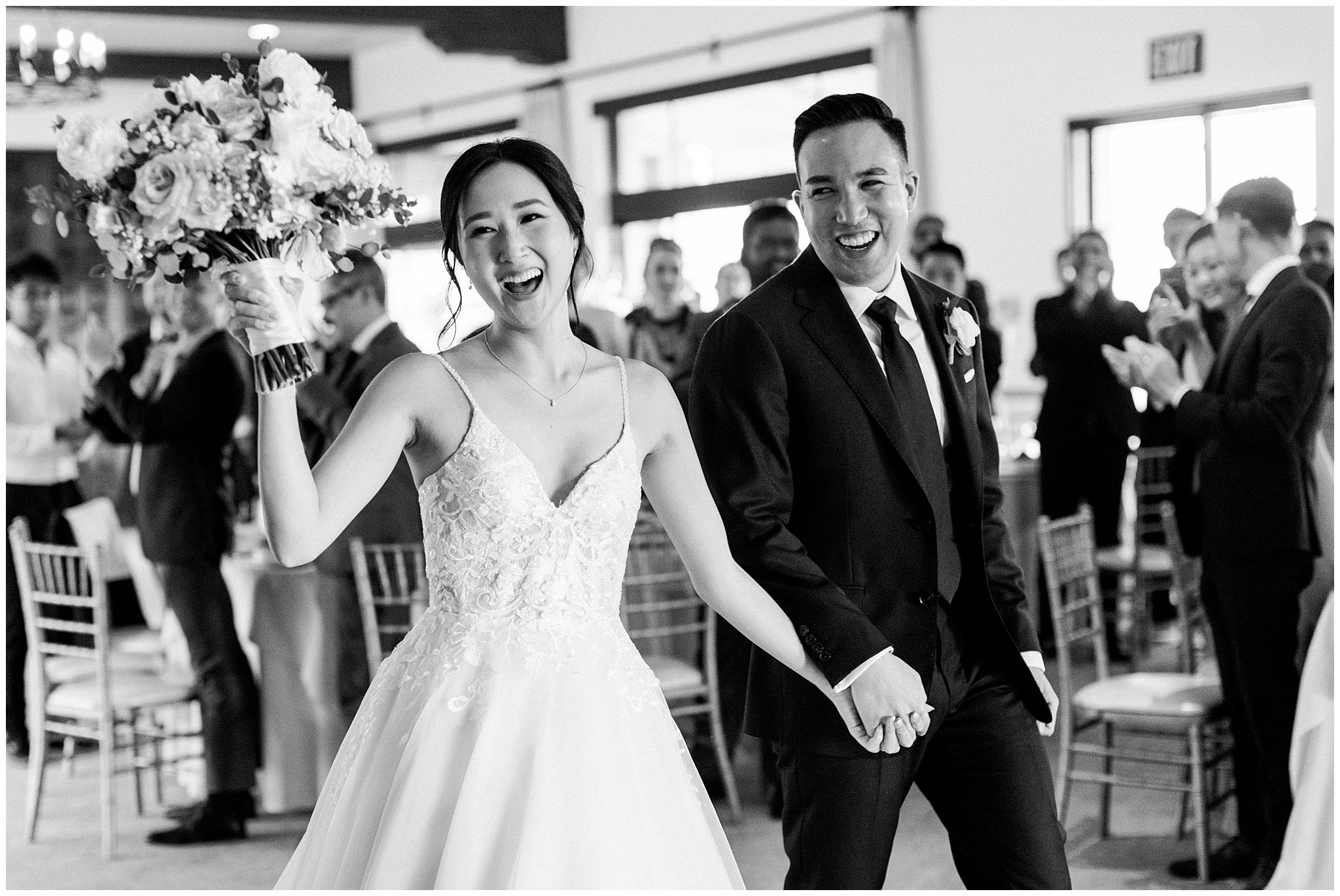 Bride and groom enter the reception at Bel Air Bay Club.  