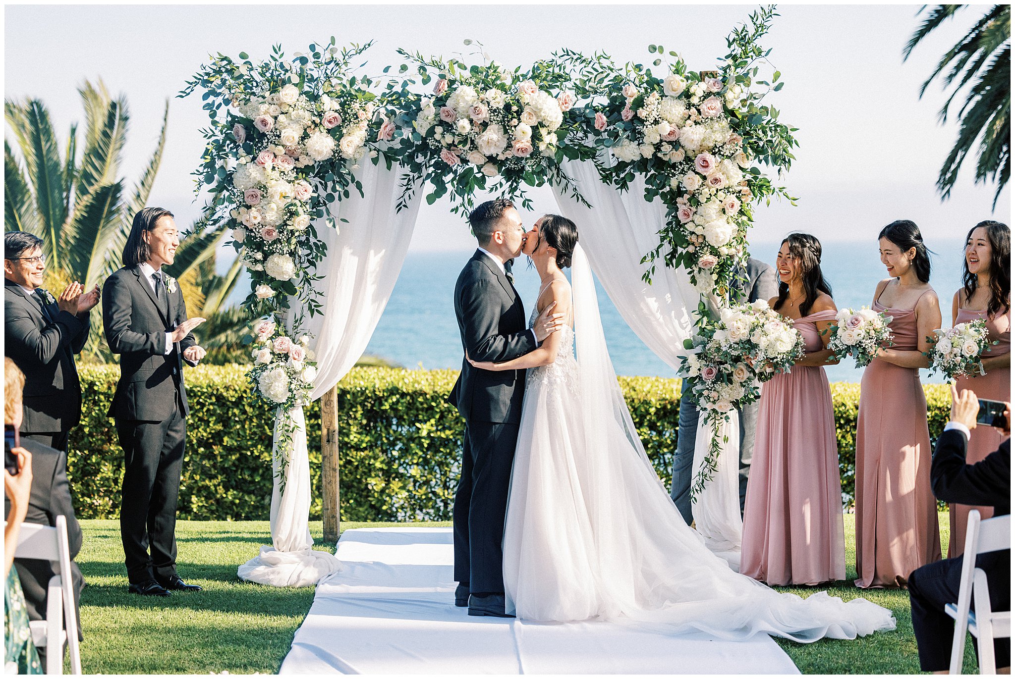 First kiss on wedding day at Bel Air Bay Club.  