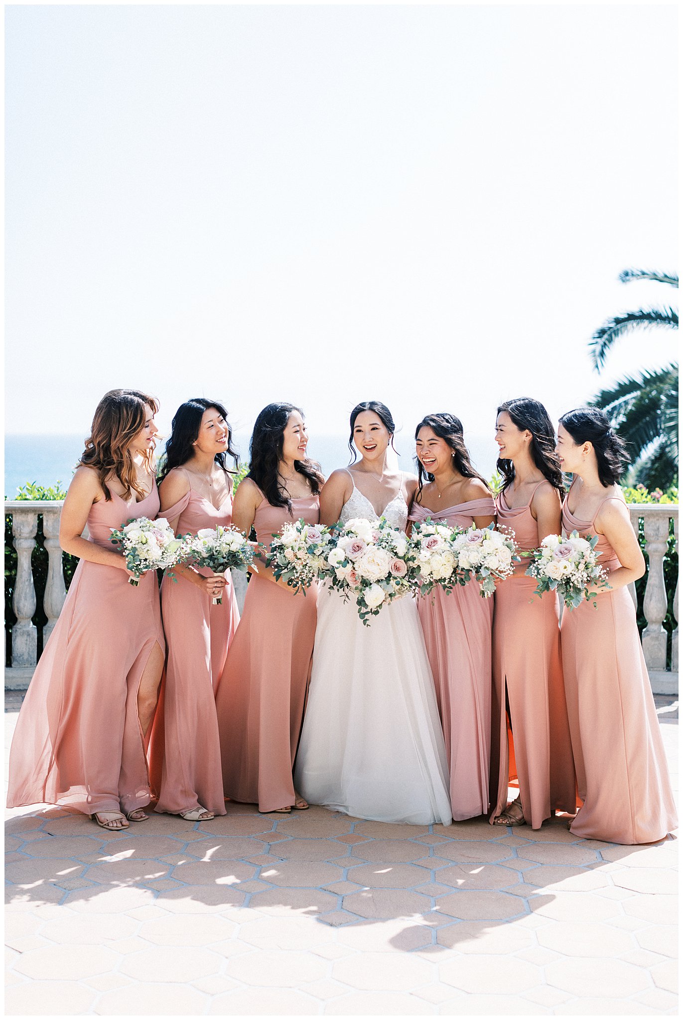 Bride and bridesmaids on wedding day at Bel Air Bay Club.