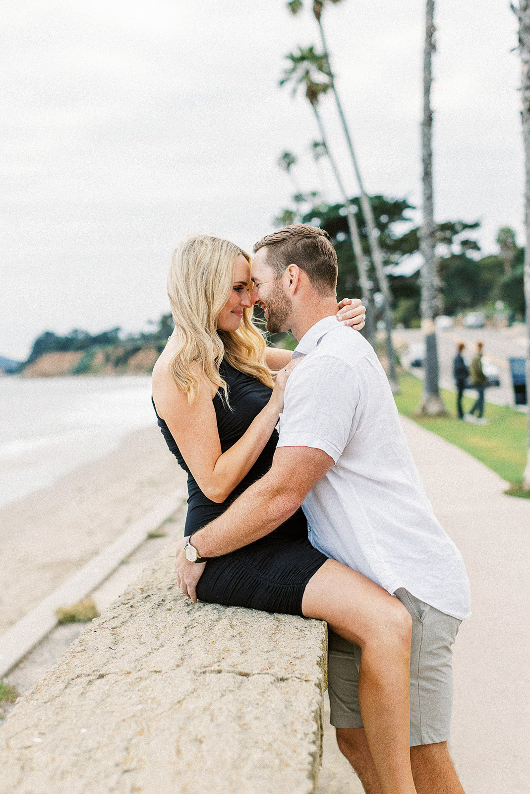 A pregnant couple embracing during their maternity session. 