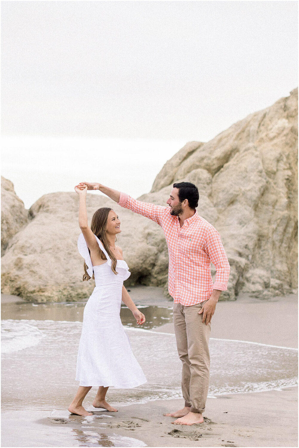 A couple dancing on the beach at Leo Carrillo beach.