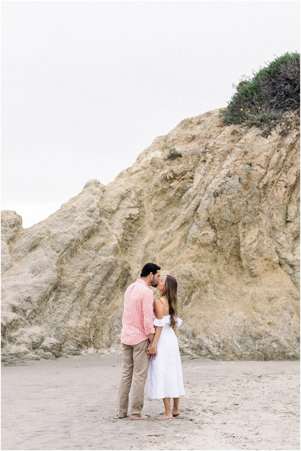 A kiss on the beach at Leo Carrillo in Malibu, Ca.