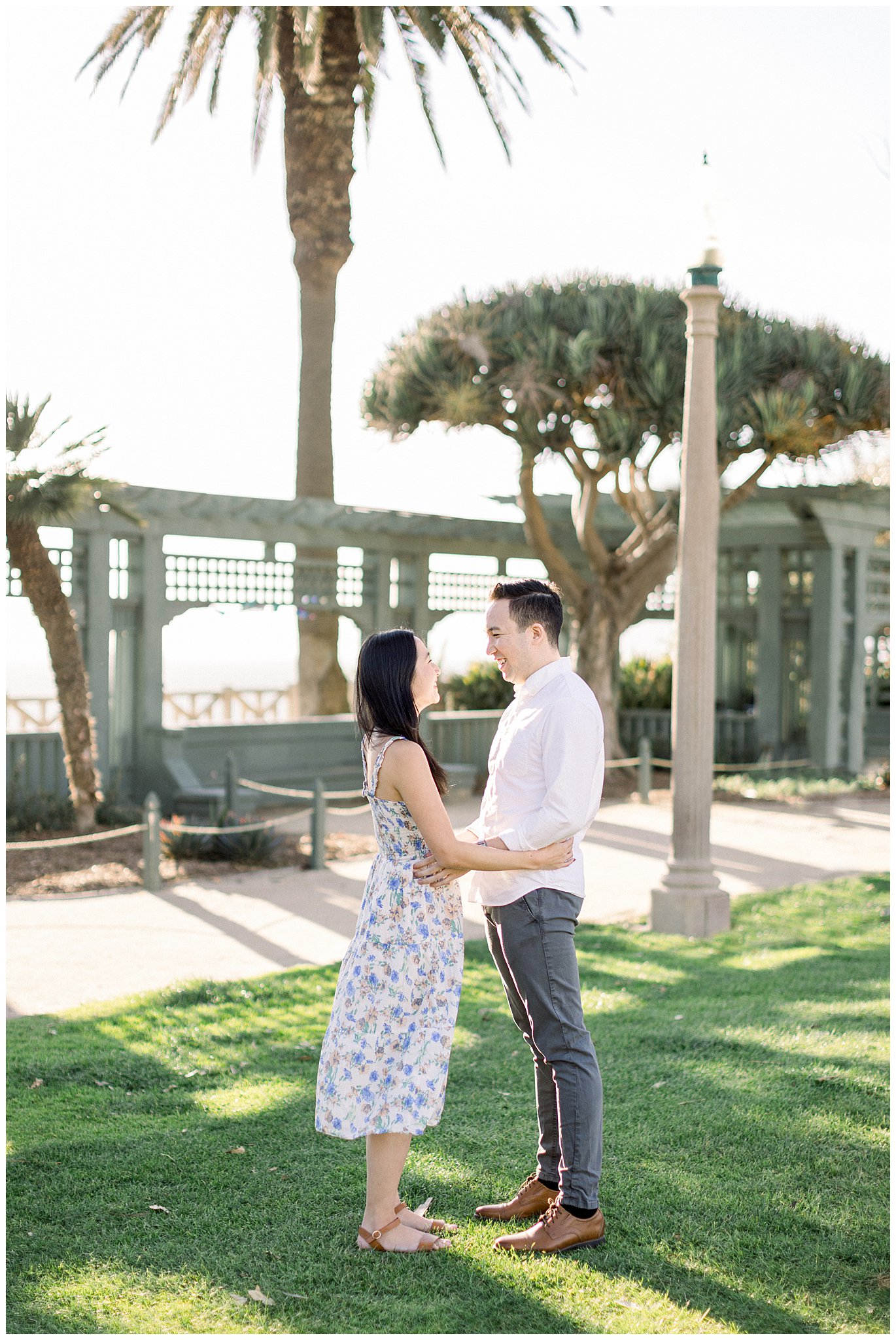 Couple sharing a laugh at Palisades Park in Santa Monica.