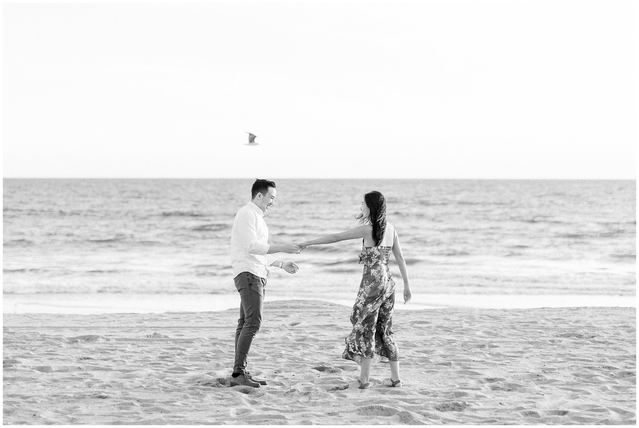 A couple dancing during golden hour at Will Rogers Beach.