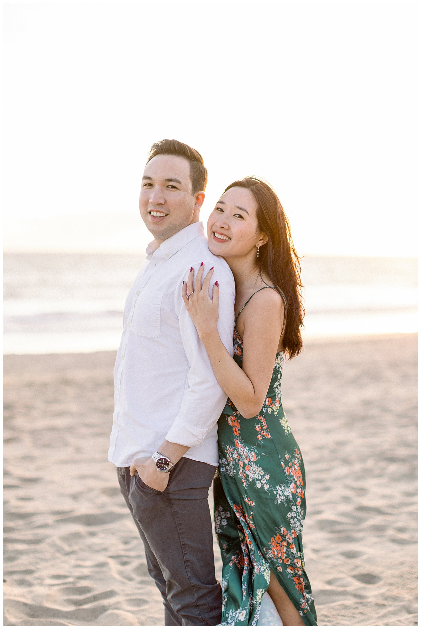 A couple embracing each other at the beach in Santa Monica, Ca.