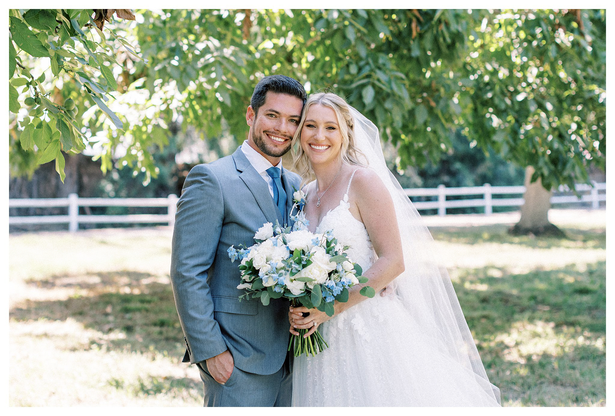 Bride and groom smiling at the camera in Moorpark, Ca.