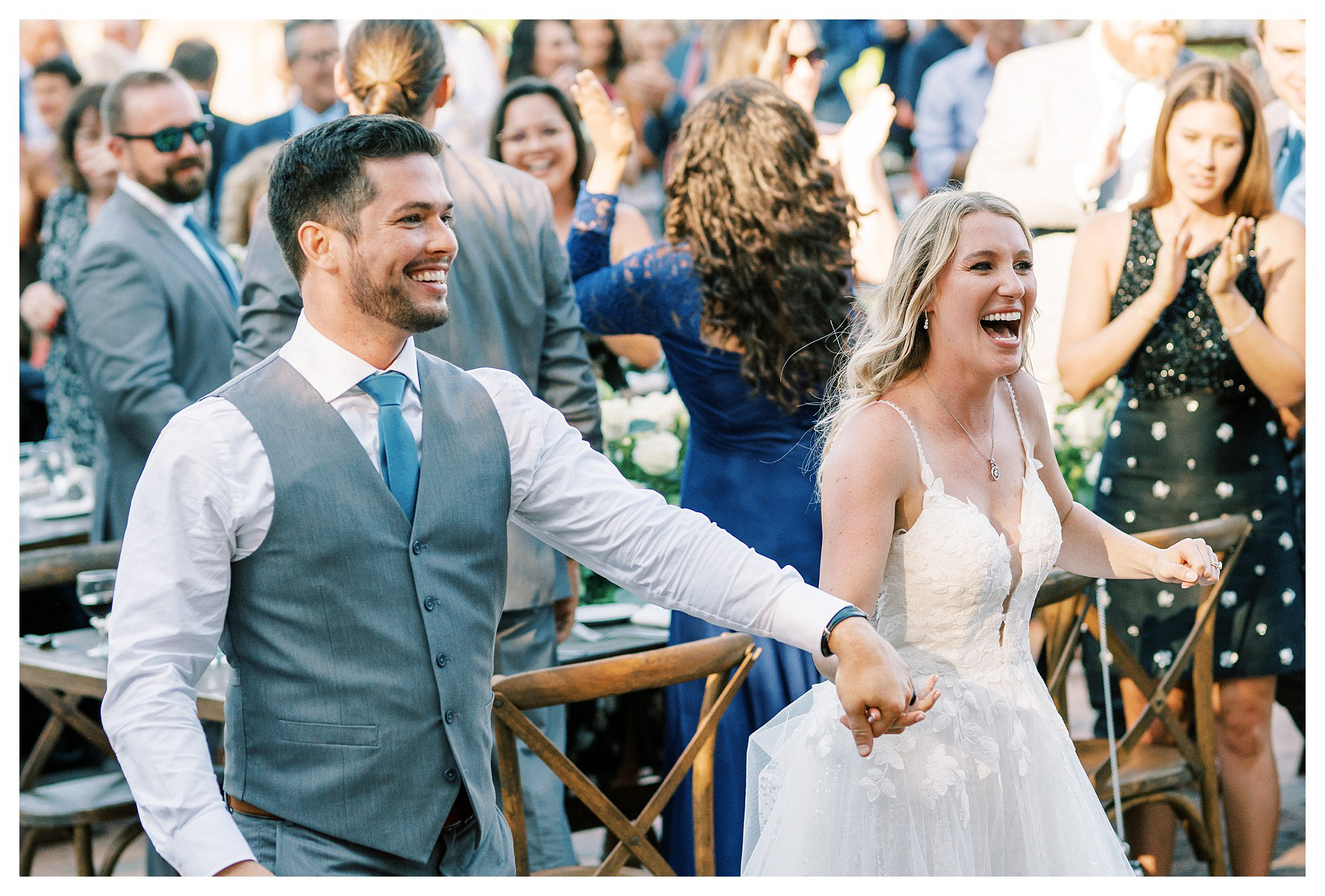 The grand entrance with bride and groom at Walnut Grove.  