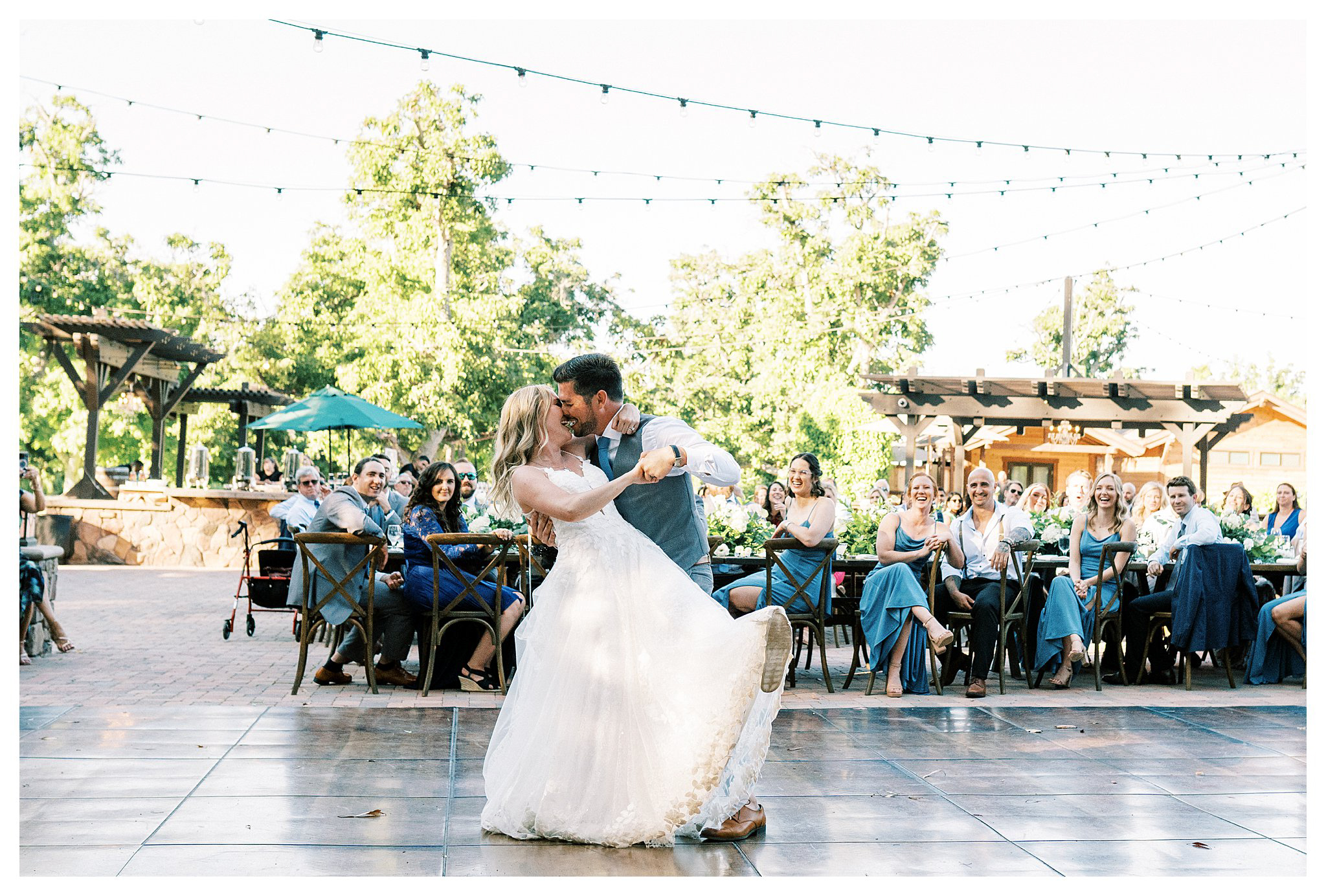 The groom dipping his bride during their first dance at wedding in Moorpark, Ca.