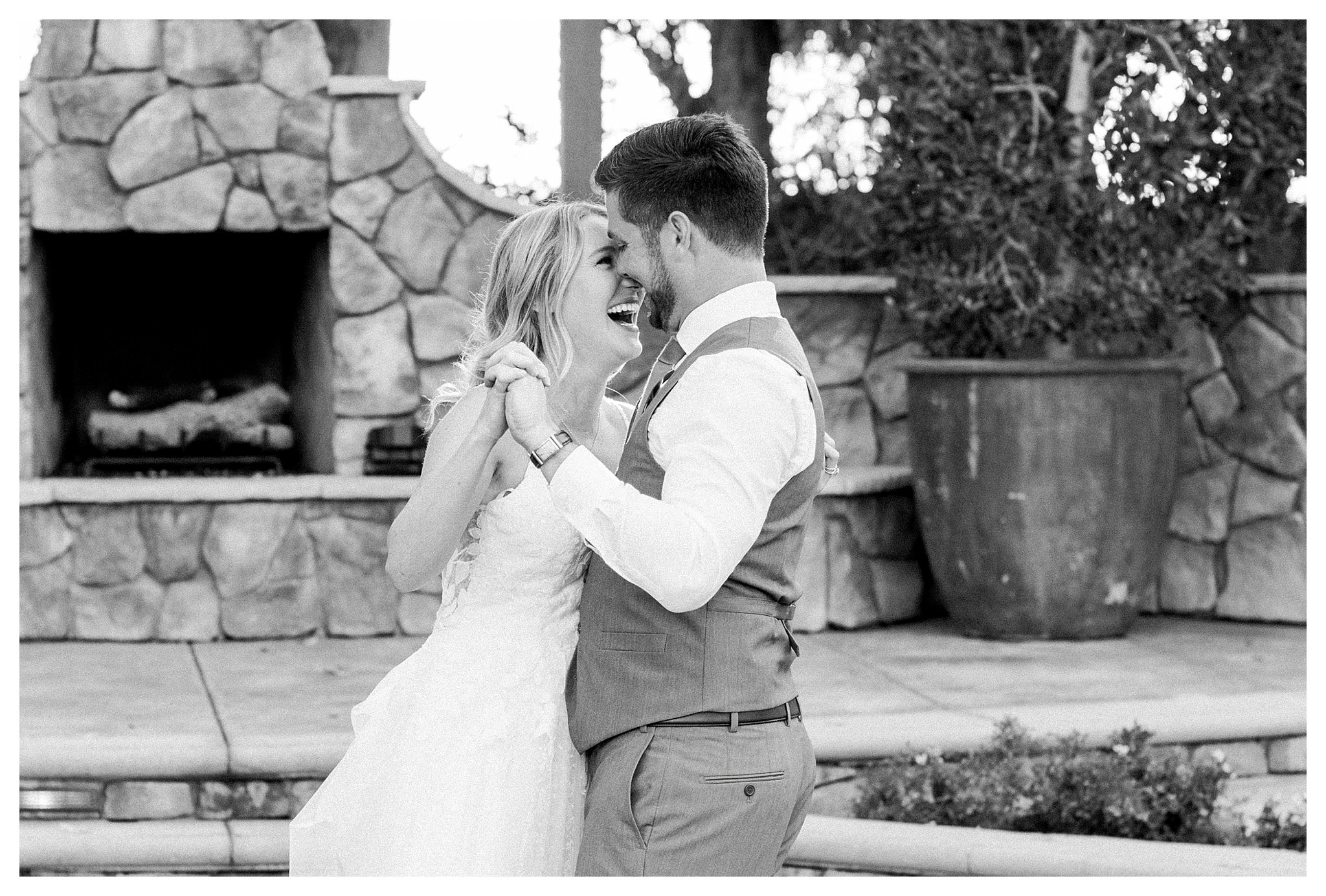 The bride and groom's smiling during their first dance at Walnut Grove in Moorpark, Ca.