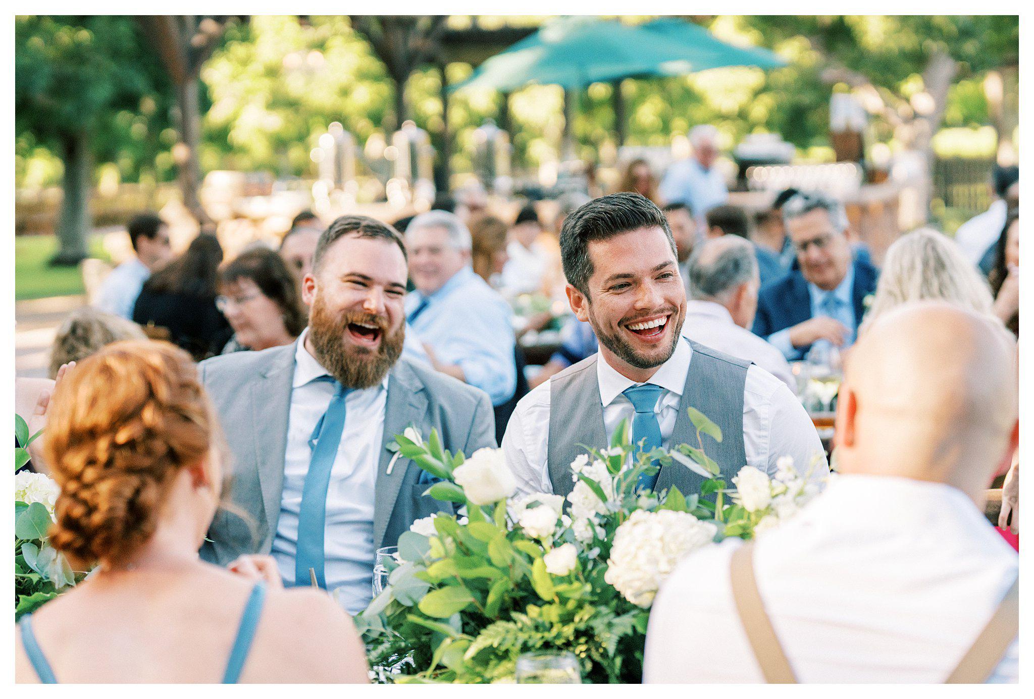 Groom and best man laughing and smiling during the reception in Moorpark, Ca.