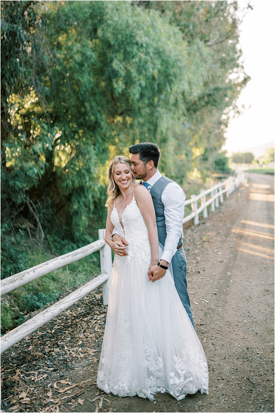 Newlyweds share a sweet moment during golden hour in Moorpark, Ca.