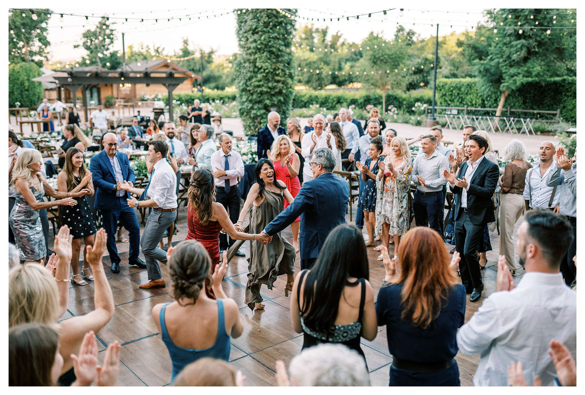 Guests dancing during the reception at Walnut Grove in Moorpark, Ca.