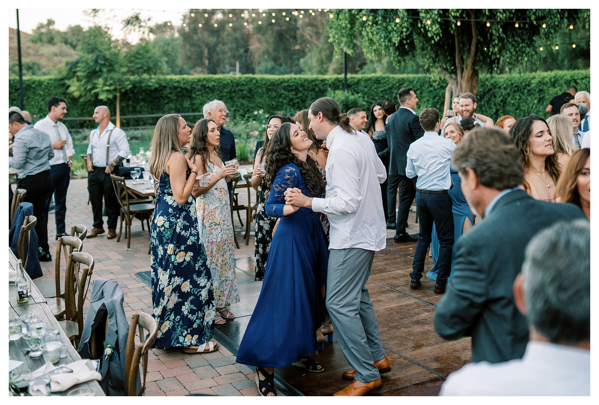 Wedding guests having fun during the reception at Walnut Grove in Moorpark, Ca.