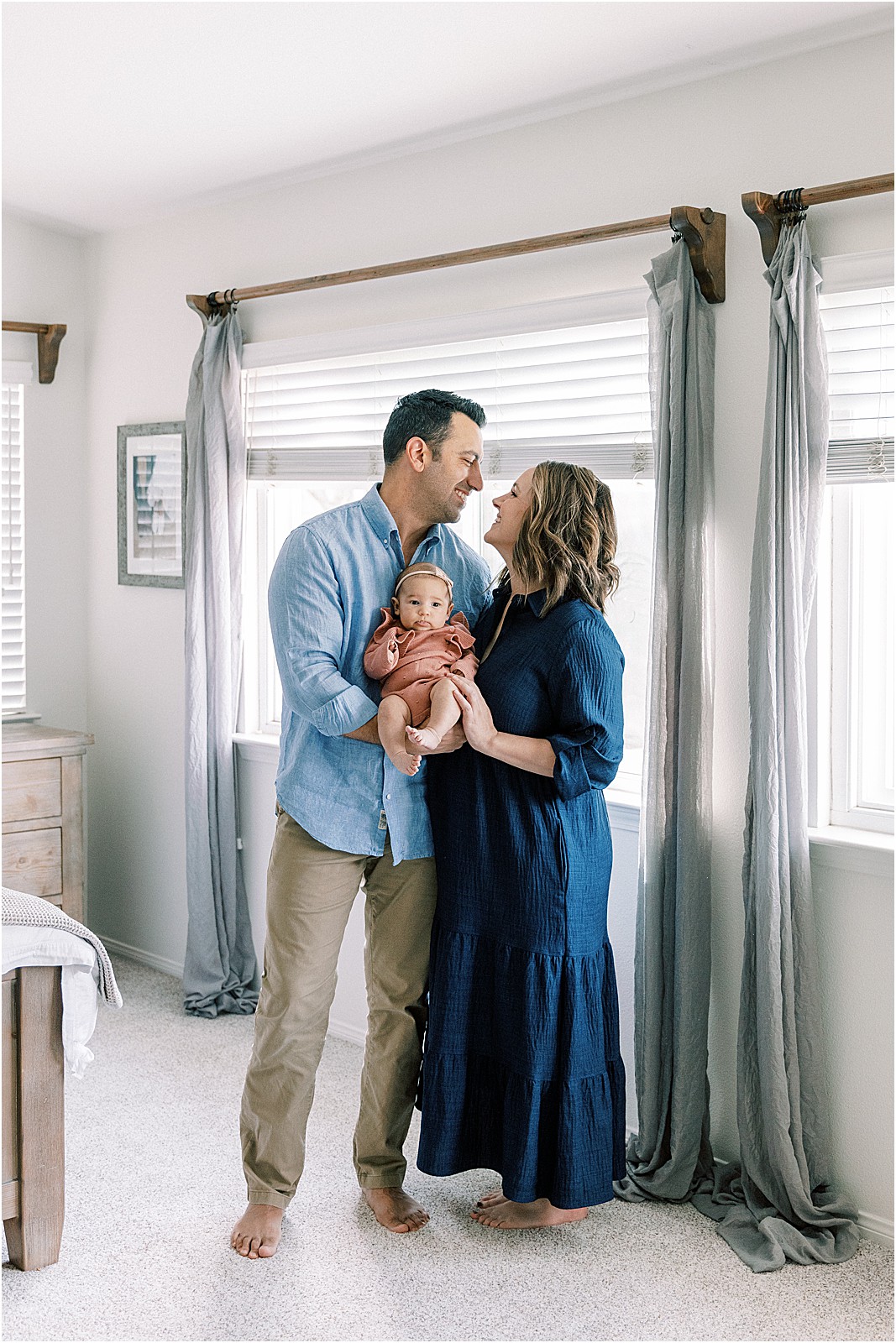 Mom and Dad having a quiet moment with their newest family member.