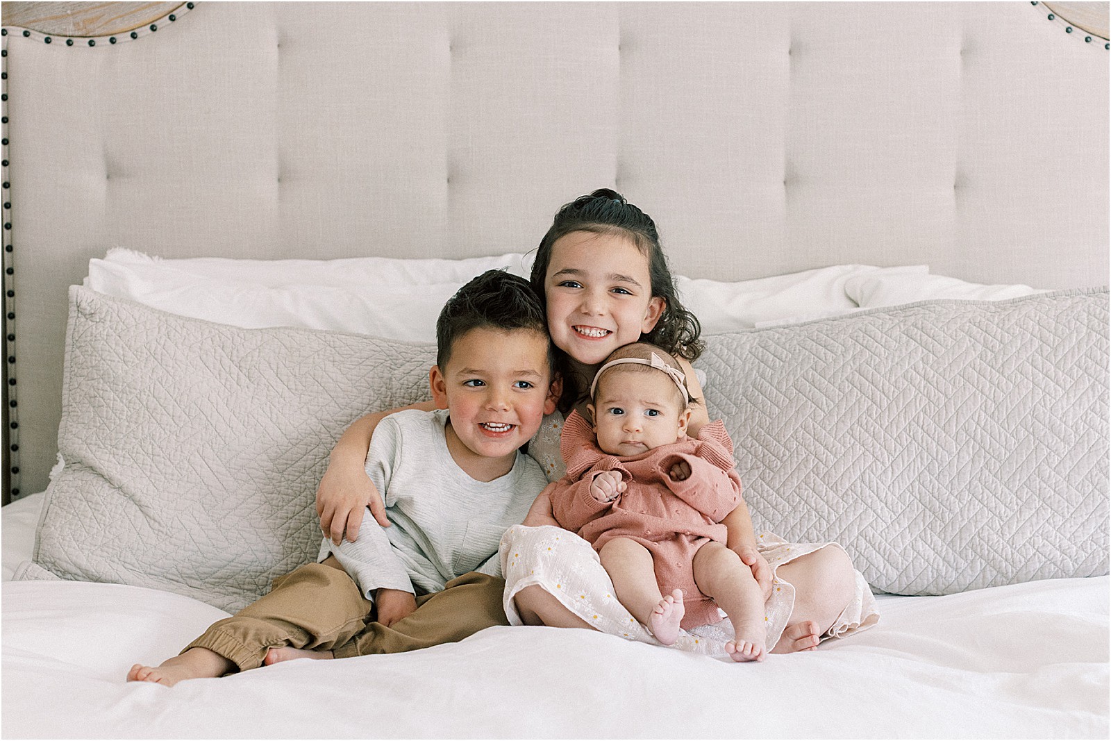 Sibling moment captured during lifestyle newborn session at home in Thousand Oaks