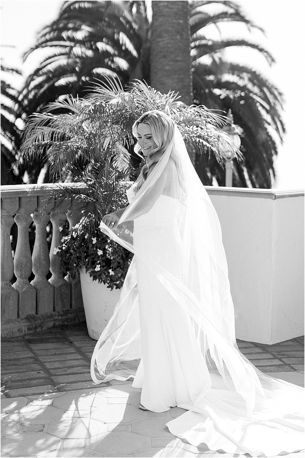 bride twirling in her gown before the first look