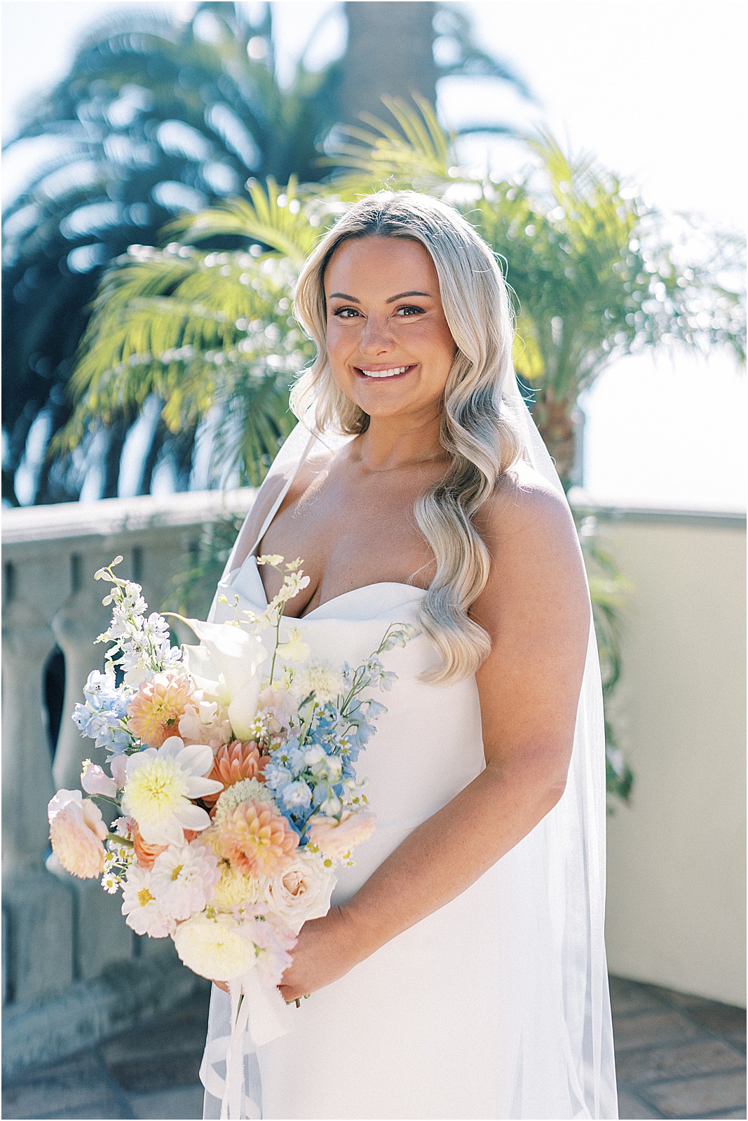 bride smiling for portrait before first look at bel air bay club