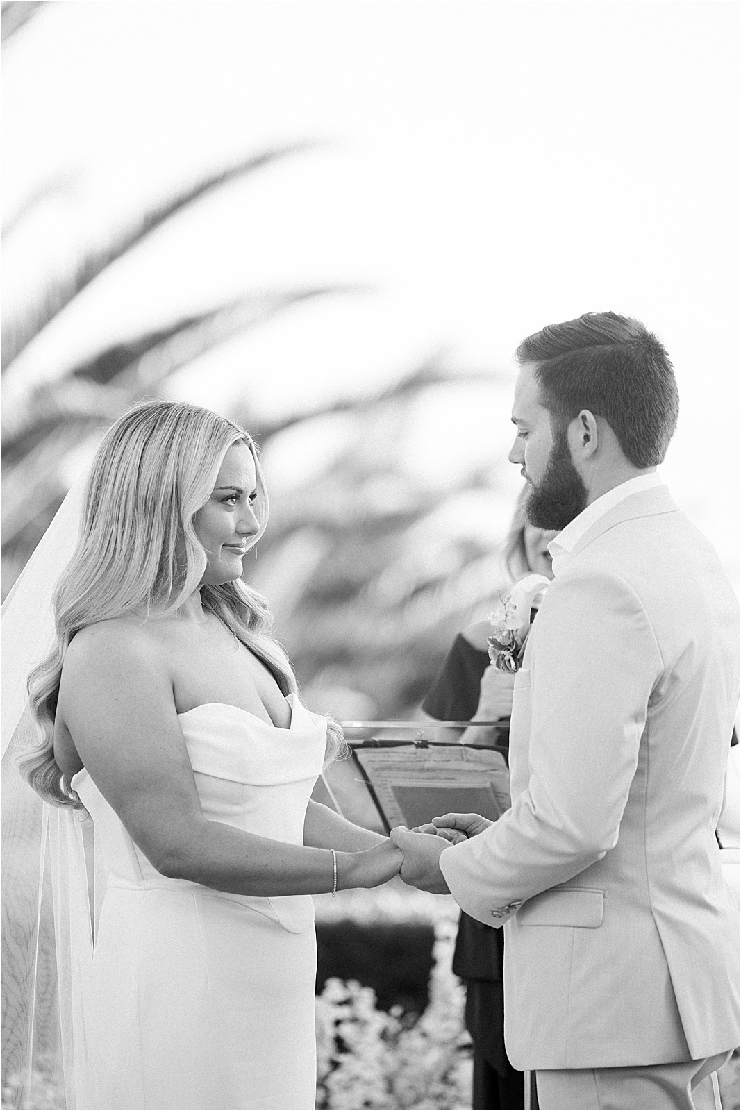 couple holding hands during their ceremony