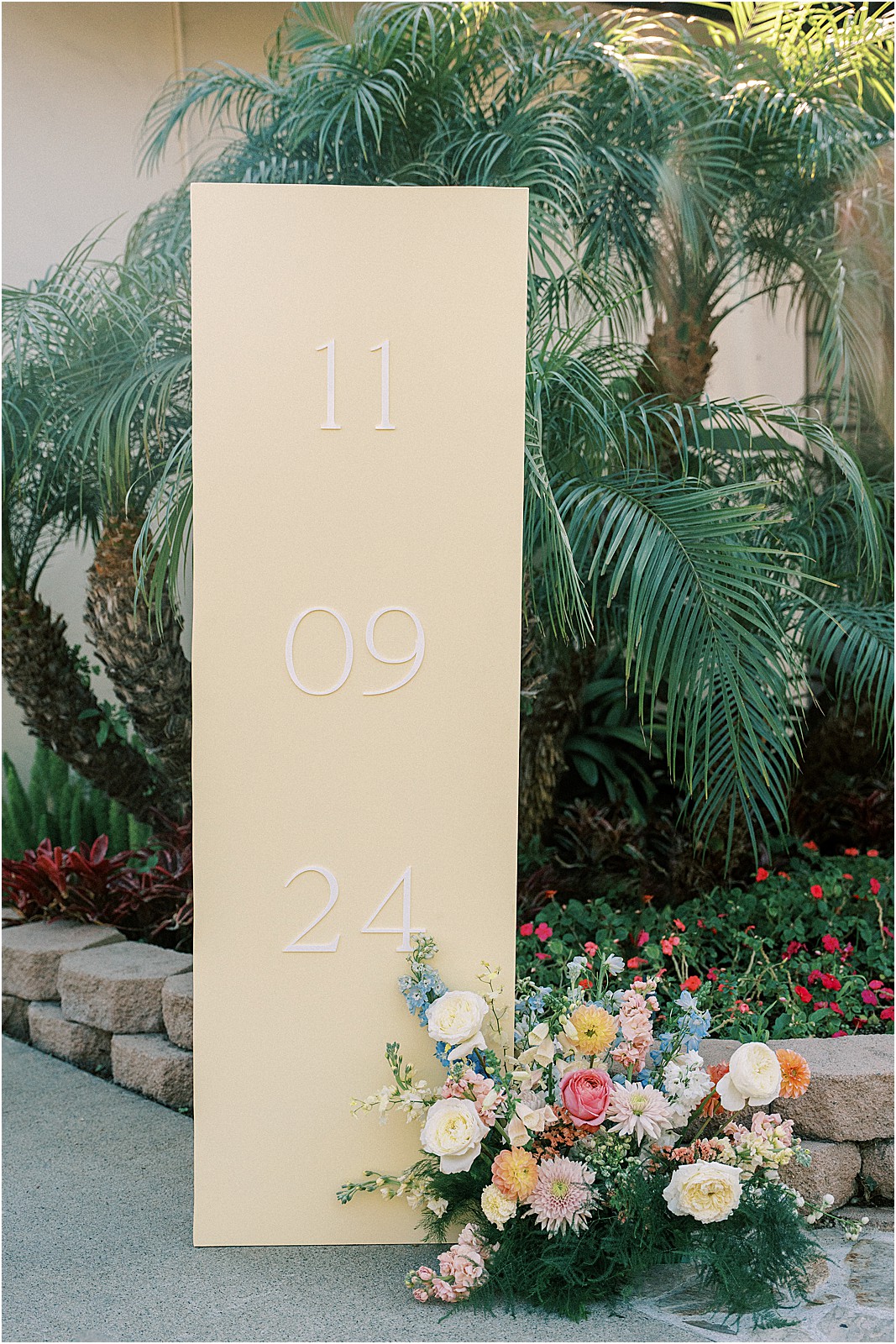 wedding date signage as guests arrive at bel air bay club in pacific palisades