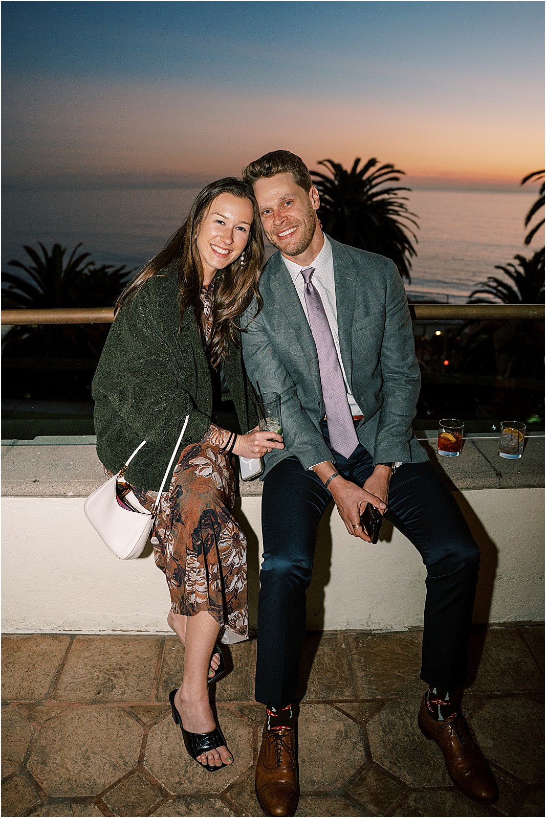 guests mingling on the patio during cocktail hour