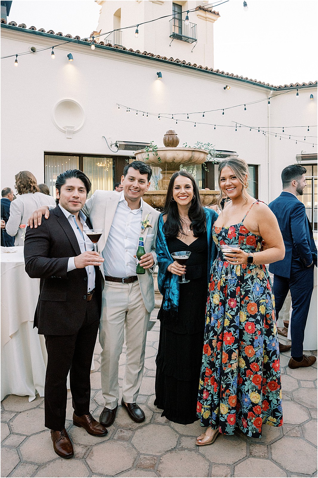 guests mingling and posing for a photo during cocktail hour at bel air bay club