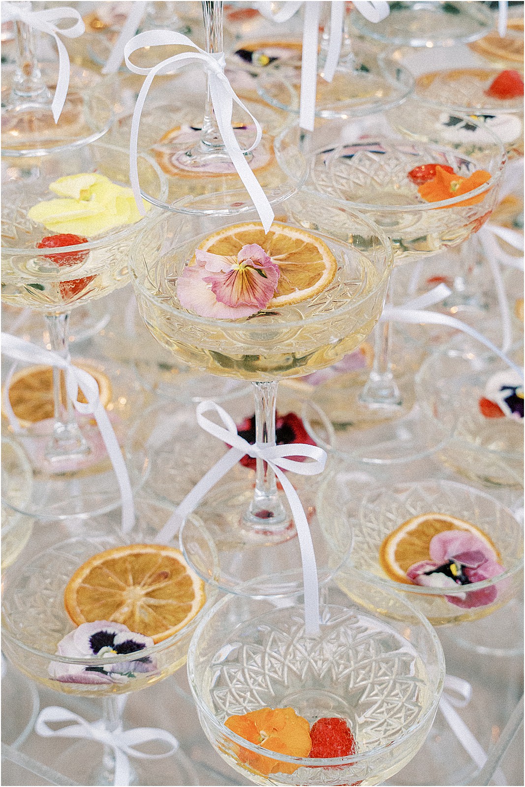 closeup of glass of champagne with editable flowers on the bel air bay club patio