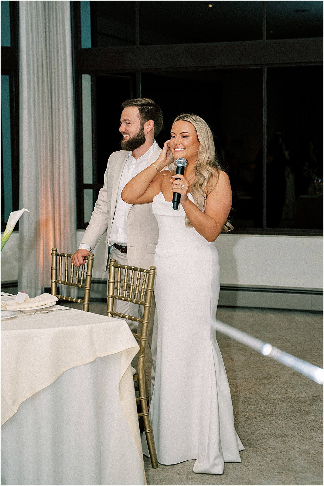 bride giving a welcome toast at her wedding at bel air bay club