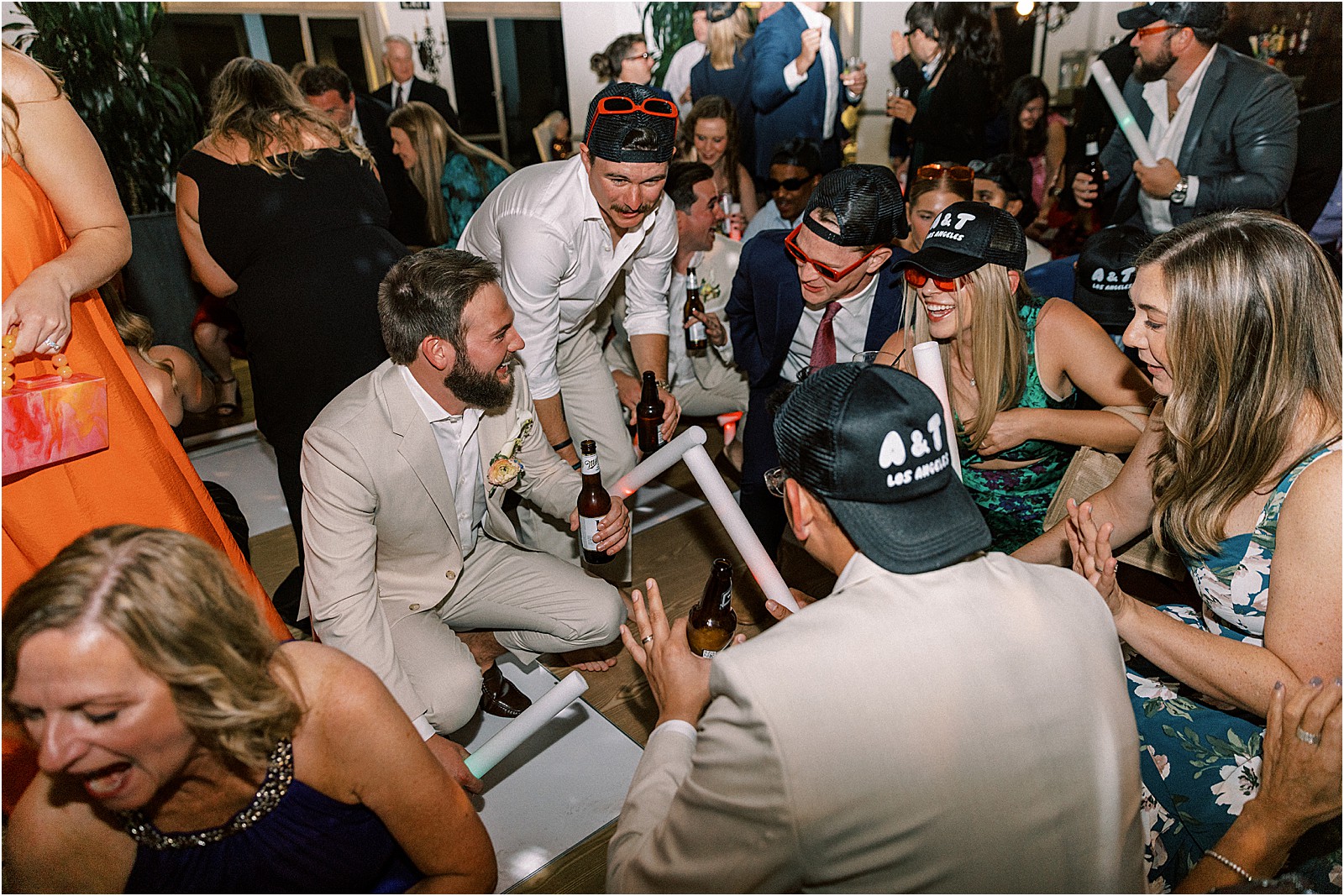 high energy moment with guests jumping and dancing